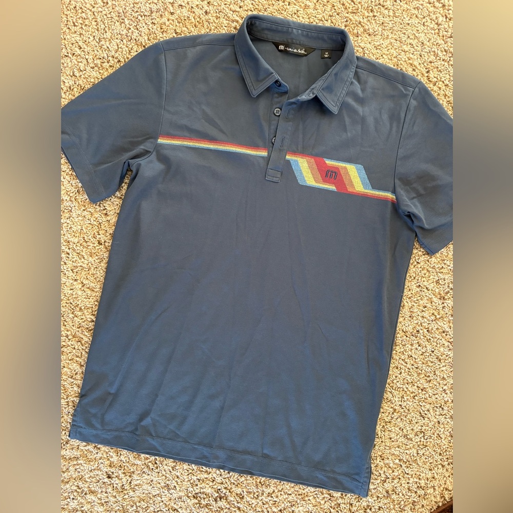 Travis Mathew Navy Polo with Colorful Stripe